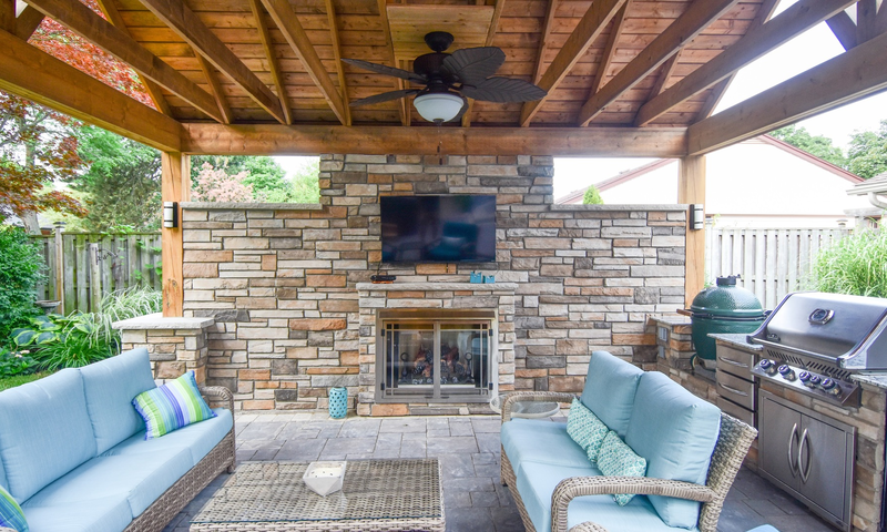 Outdoor kitchen on patio under pergola