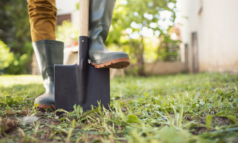 Person Digging into Grass